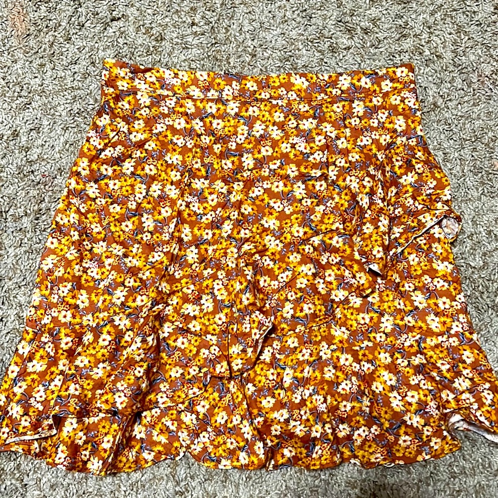orange and yellow skirt with ruffles and flowers. size medium. brand originality